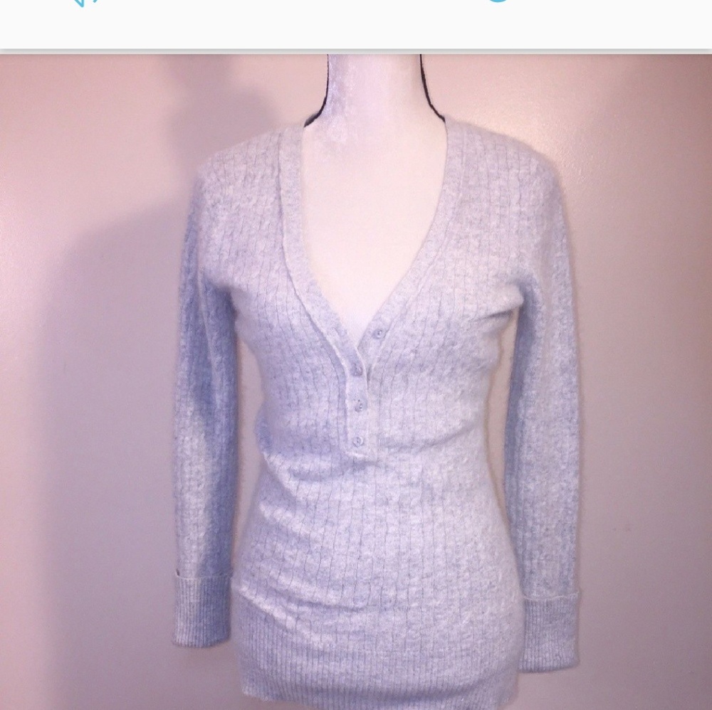 Sweater.. beautiful just too small for me.